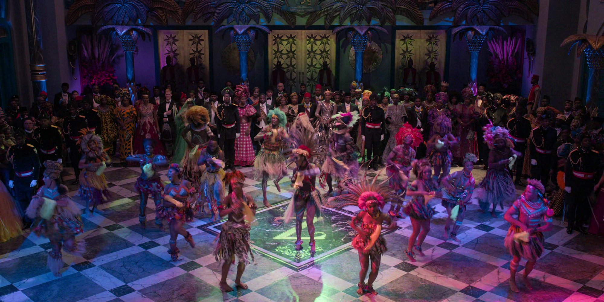 Coming 2 America palace celebration scene with dancers on a checkered floor