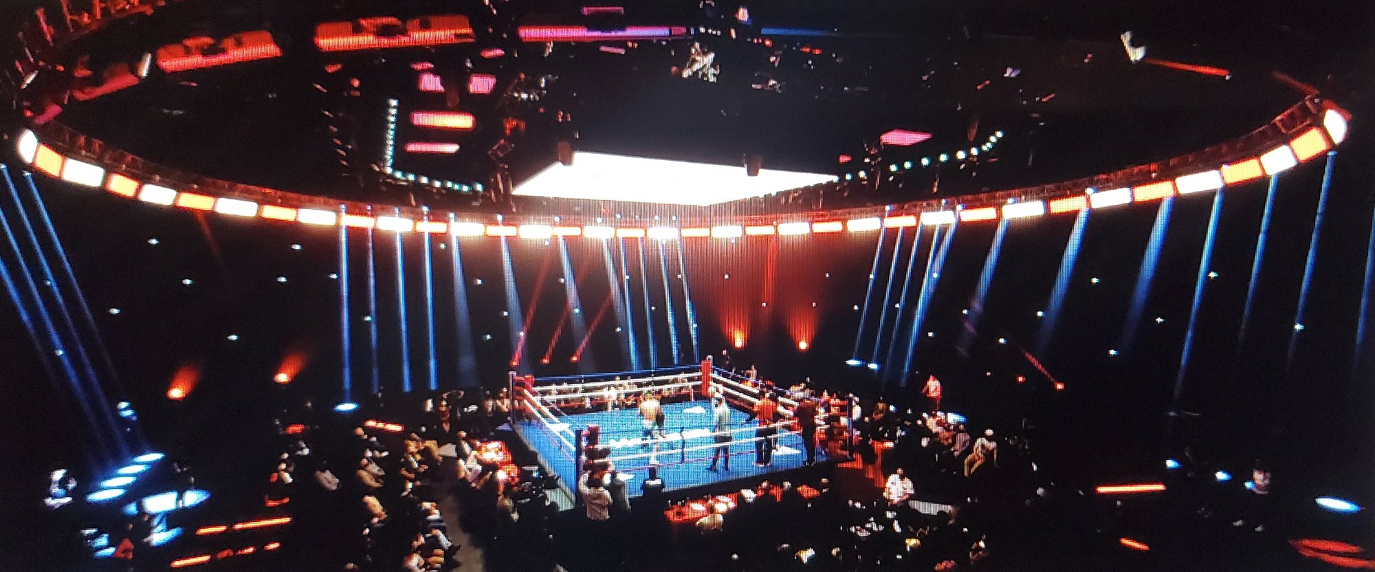 Creed 3 boxing arena lit for the fight scene